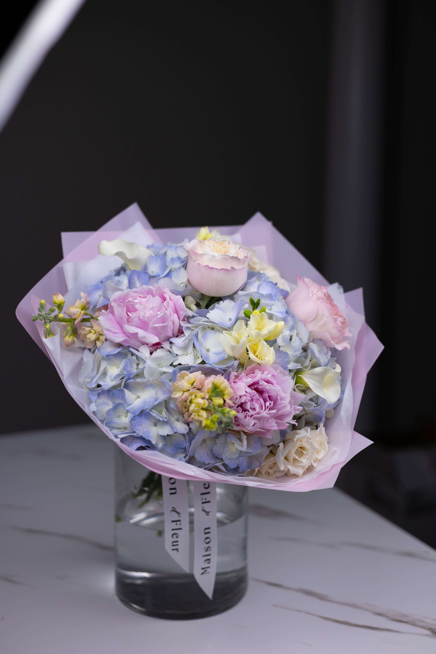 Close-up of premium hydrangea and pastel peony bouquet by high-end florist in Charlotte
