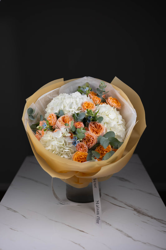 Orange garden roses and hydrangea bouquet – Maison d’Fleur Charlotte NC