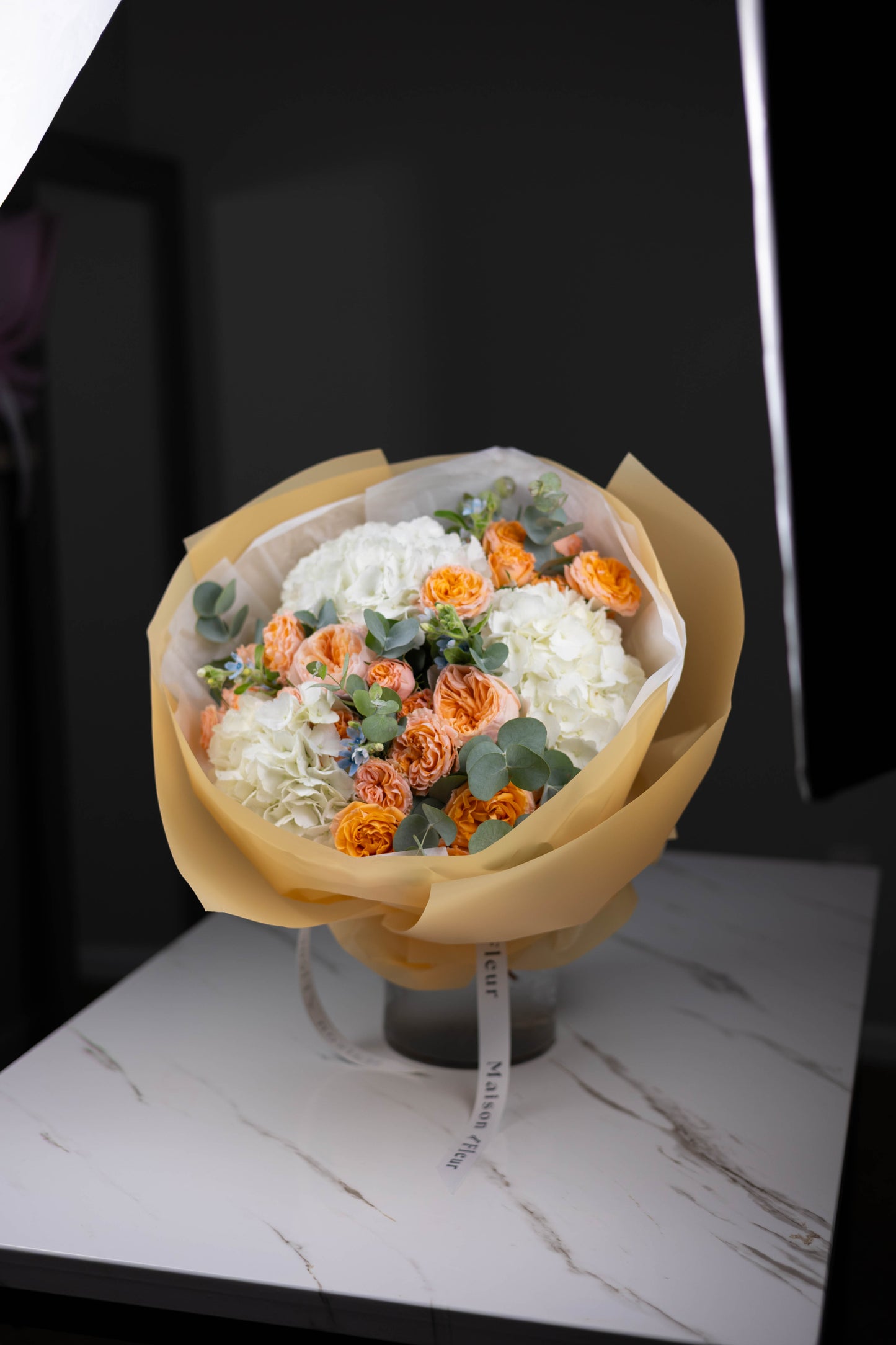 Bright white and orange flower bouquet for birthday or congratulations