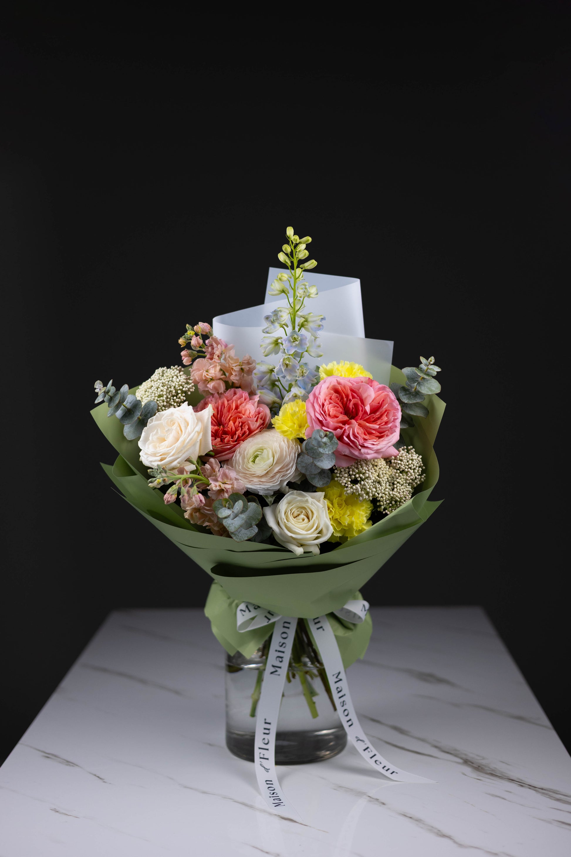 Soft pastel flower bouquet with ranunculus and garden roses in Charlotte NC
