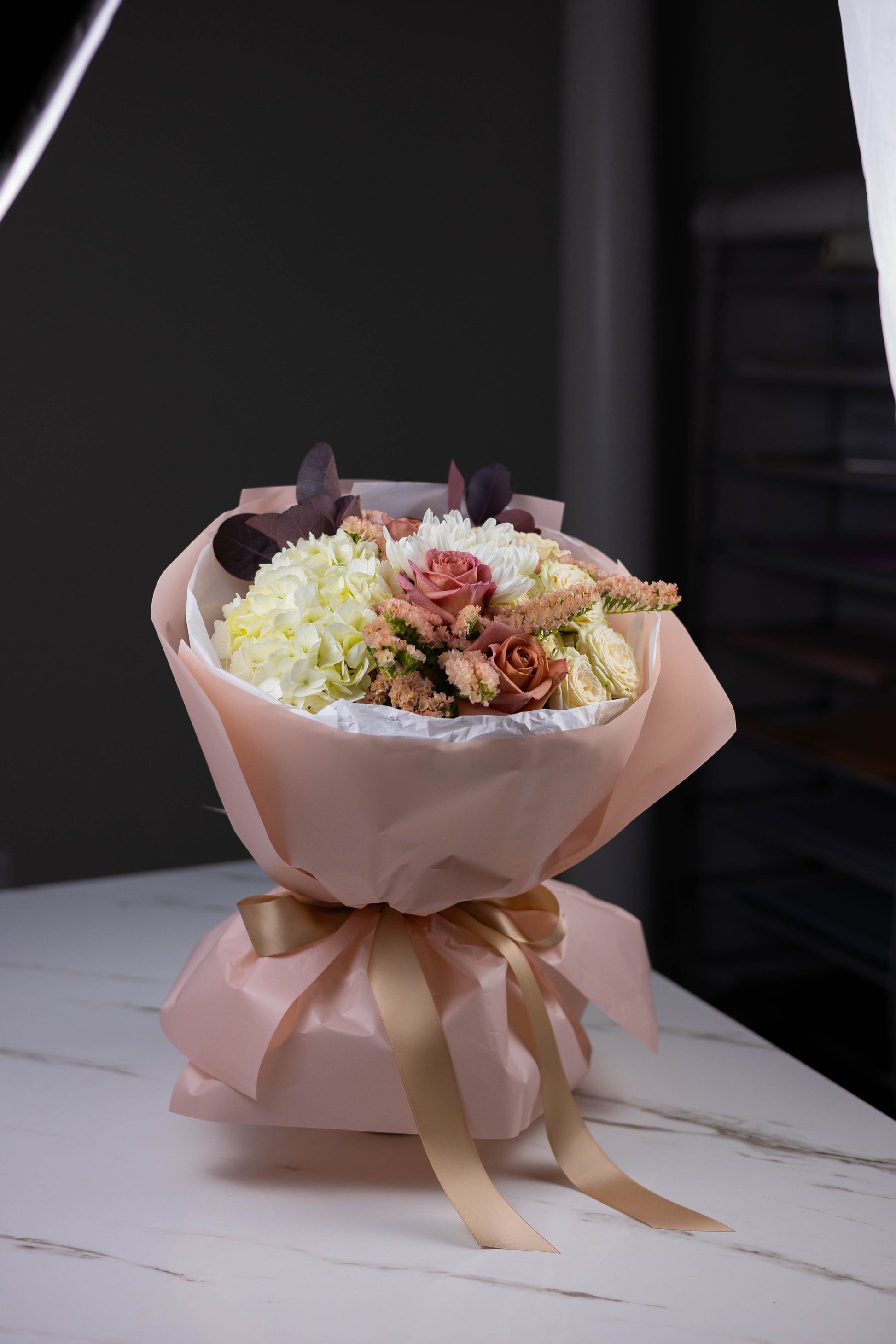 Cream and blush flower arrangement with roses and mums from Maison d’Fleur, local Charlotte florist offering delivery in North Carolina.