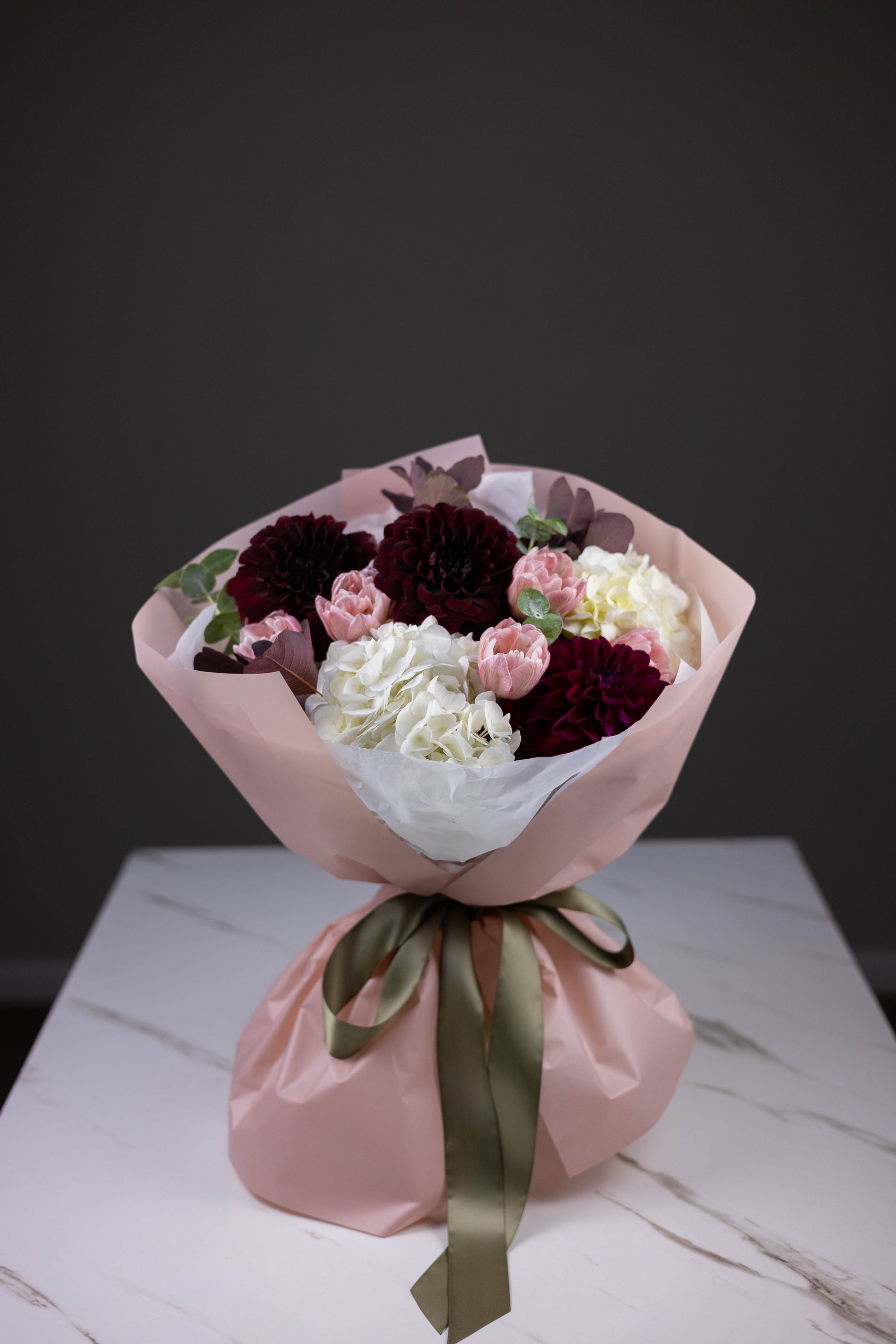 Modern flower bouquet on marble table, perfect for delivery in Charlotte, North Carolina