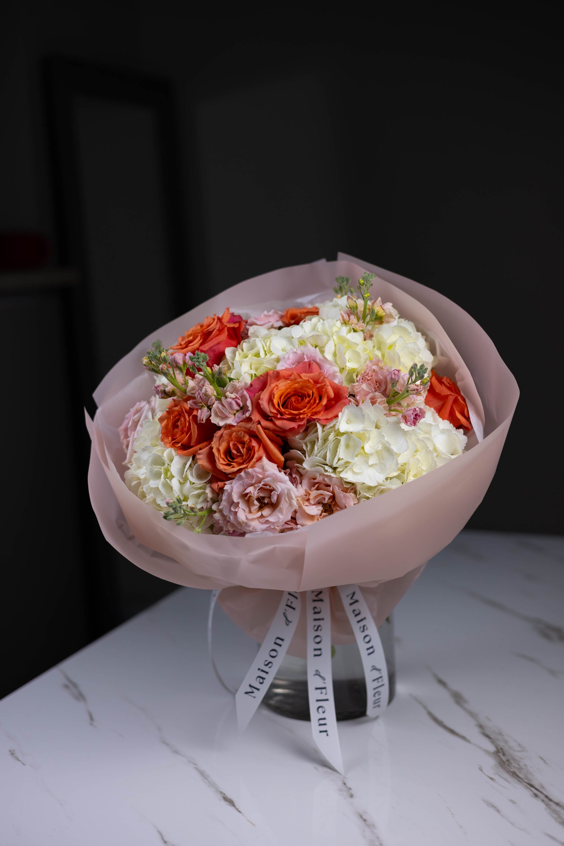 Elegant summer floral gift with premium white hydrangeas and coral roses