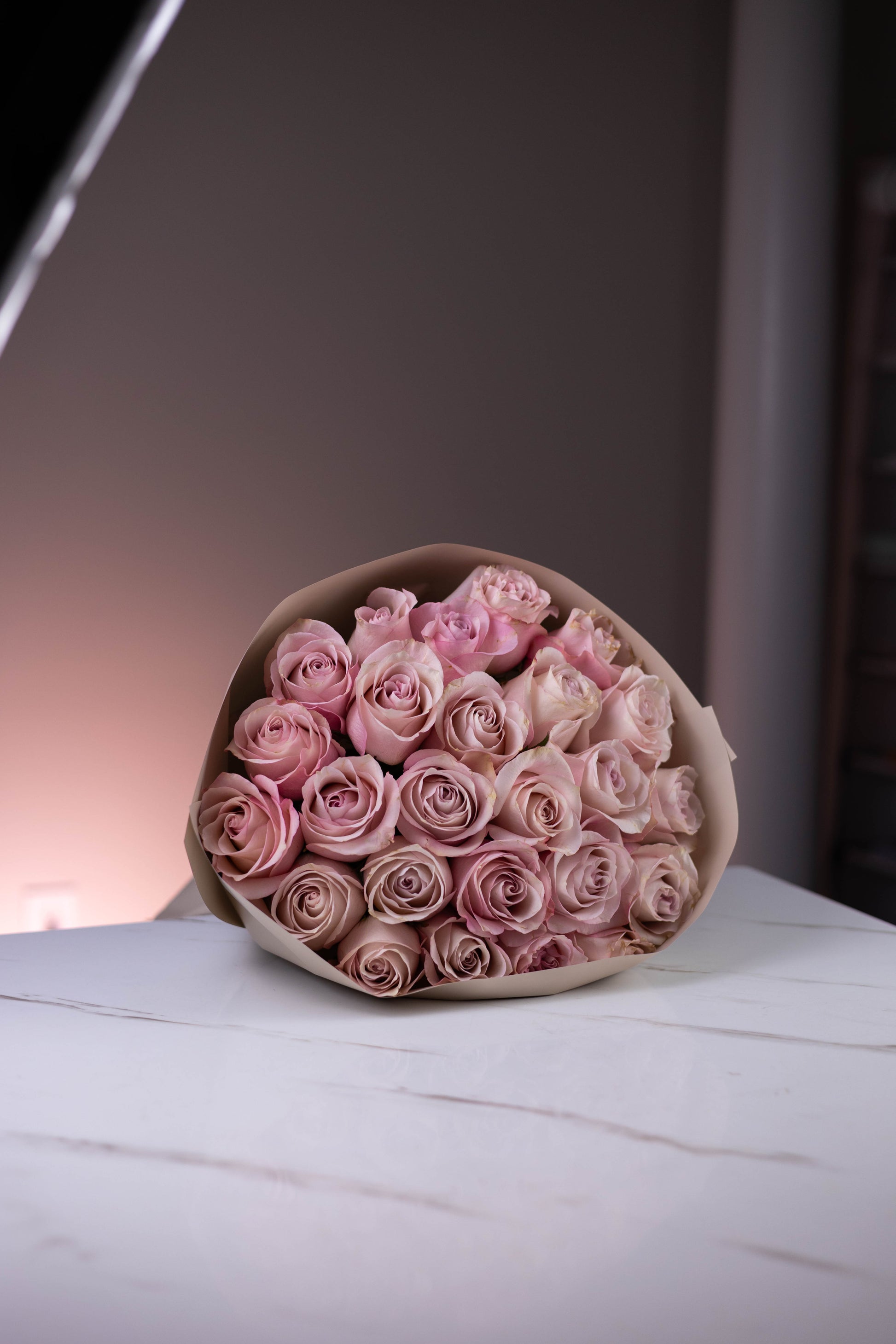 Side view of blush pink rose bouquet with modern wrapping – Charlotte same-day flower delivery